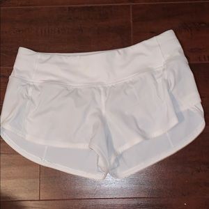 size 4 white lulu lemon shorts